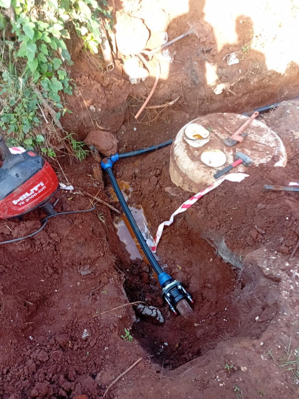 Exposed underground water meter and pipework